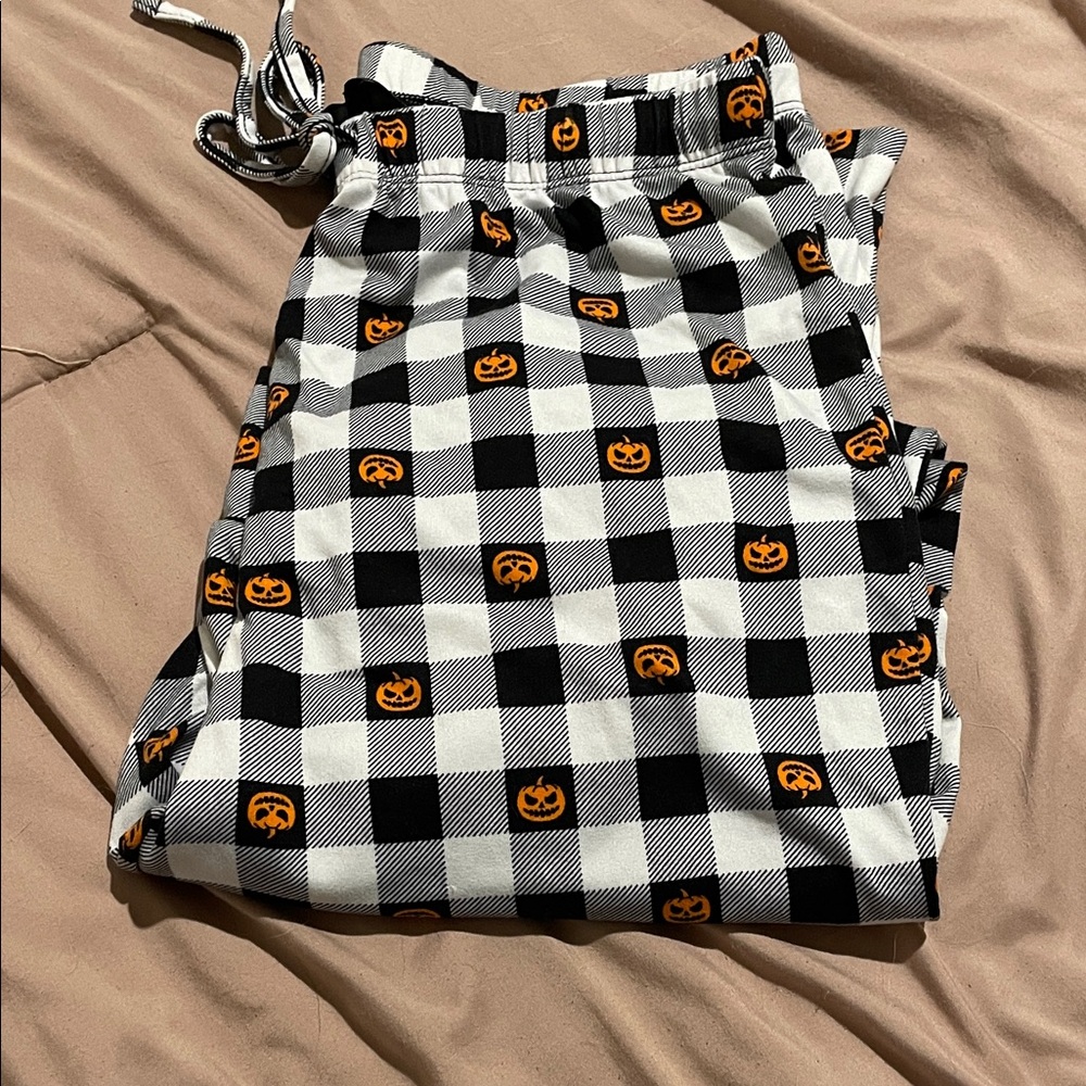 Black and White Checkered Pajama Pants with Orange Pumpkin Print